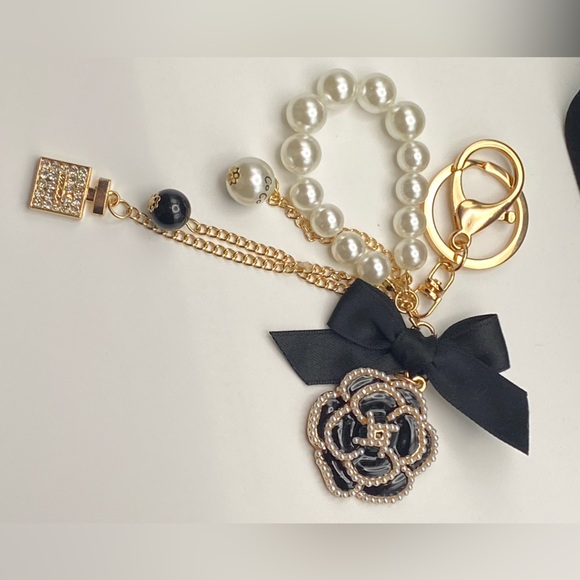 Accessories - Elegant Pearl and Gold Keychain with Black Bow